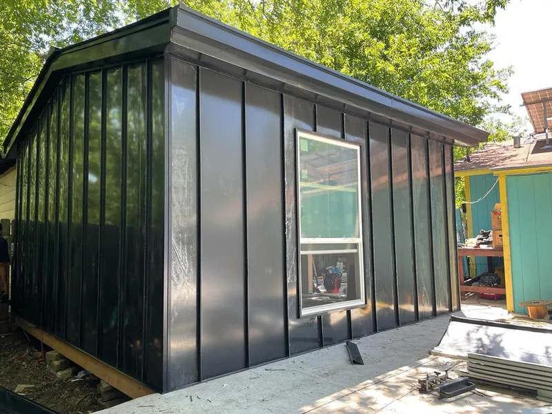 Black standing seam metal wall panels for Metal Roof Installation in Missouri City