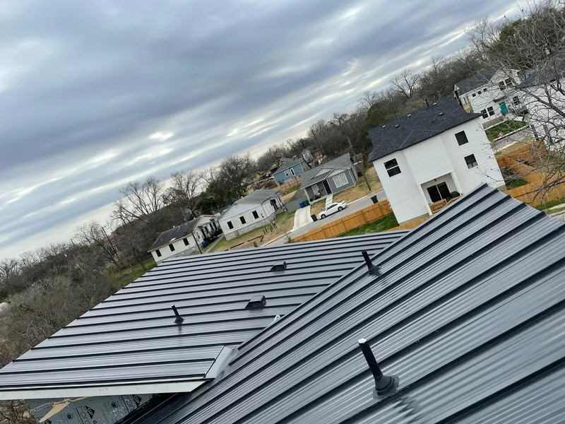 Standing seam metal roof panels with vents for Skylight Repair in Missouri City